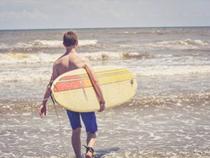 Coastal Living Vacation Rentals | Surfing in Galveston
